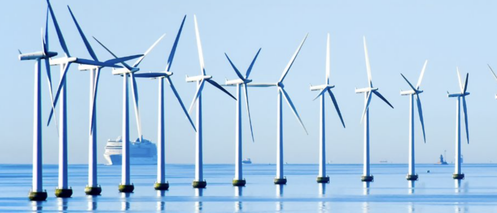 Floating offshore wind farm in open water, symbolising system-level engineering, environmental compliance, and long-term asset performance for floating wind developments.